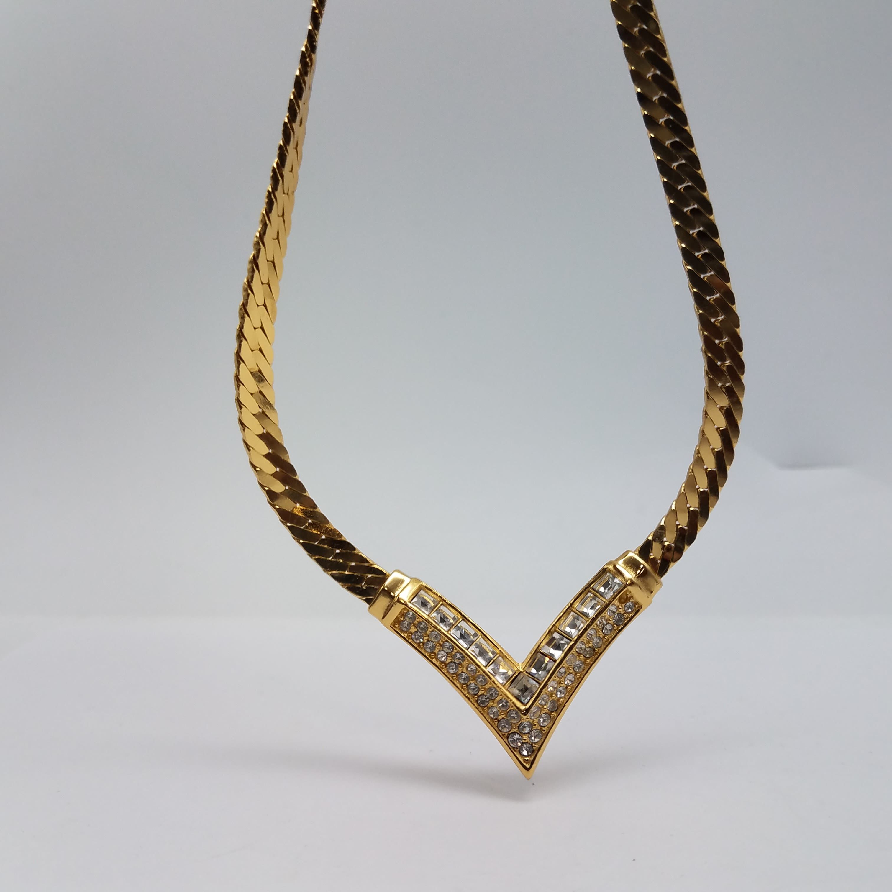 Christian Dior Vintage Golden Dangling CD Charm Bow Choker Necklace –  Amarcord Vintage Fashion