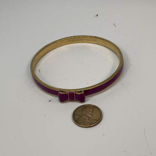 Designer Kate Spade Gold-Tone Take A Bow Purple Classic Bangle Bracelet image number 3
