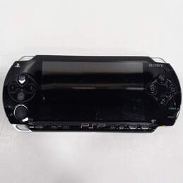Black Sony PSP w/ Brown Leather Case alternative image