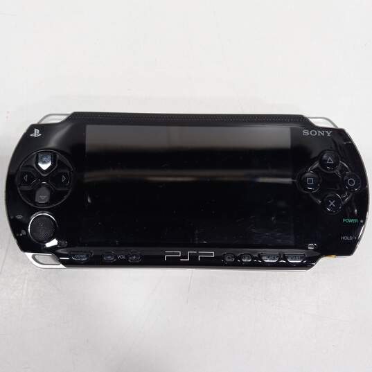 Black Sony PSP w/ Brown Leather Case image number 2