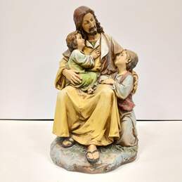Statue of Jesus Holding Children