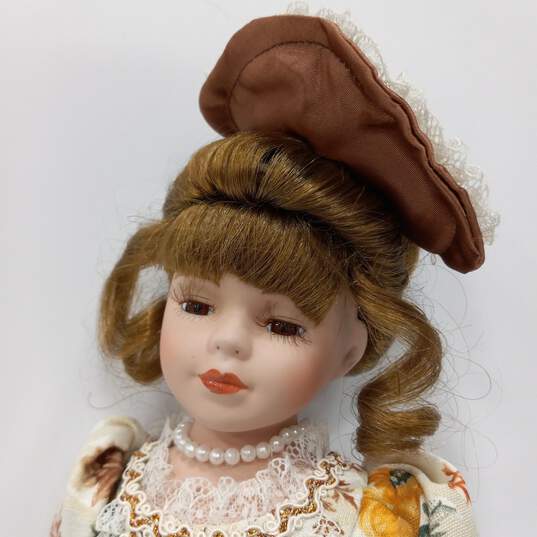 Porcelain Doll w/ Floral Lace Outfit image number 4