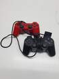 x2 Sony Playstation Controllers Wireless and Corded Black & Red image number 1