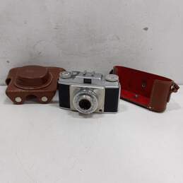 Gray & Black Camera w/ Brown Leather Case