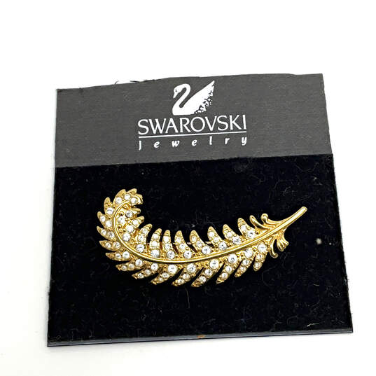 Designer Swarovski Gold-Tone Crystal Clear Rhinestone Feather Brooch Pin image number 1