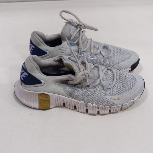 Women's Platinum Tone & Gold Tone Nike  CZ0596-049 Free Metcon 4 Trainers Size 8 image number 1