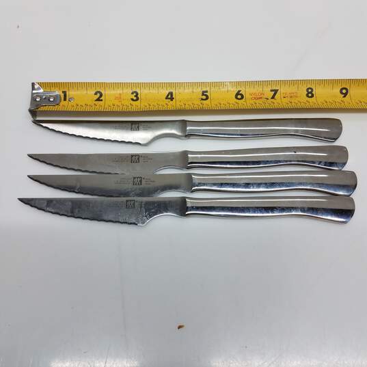 Buy the Set of 4 JA Henckels kitchen metal steak knives