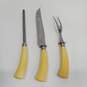 PAIR OF YELLOW BAKELITE HANDLED HONING ROD AND CARVING KNIFE image number 2