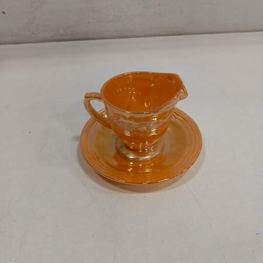 Fire King Teacup and Saucer image number 1