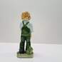 Porcelain Young Boy with Overalls and Hat Figurine image number 2