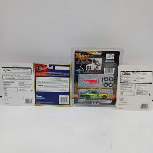 4 Collector Vehicles in Original Packages image number 2