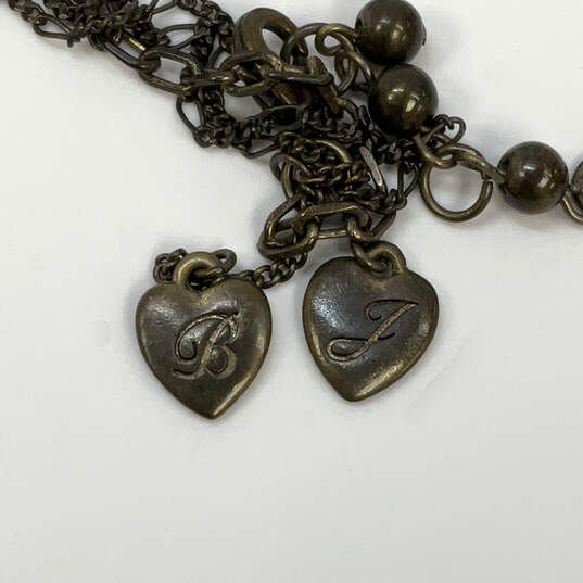 Designer Betsey Johnson Triple Strand Chain Heart Shape Pendant Necklace image number 4