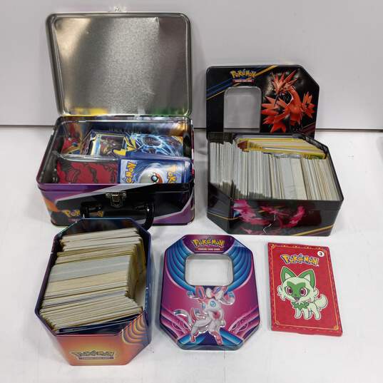 Pokemon Cards in 3  Metal Boxes image number 1