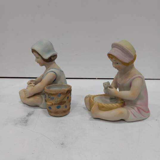 Pair of Ceramic Figurines of Children image number 2