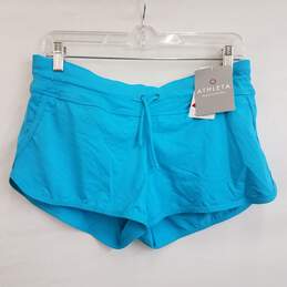 Athleta turquoise low rise running shorts with built in panty M nwt