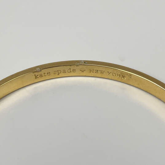 Designer Kate Spade New York Gold-Tone Round Shaped Bangle Bracelet image number 4