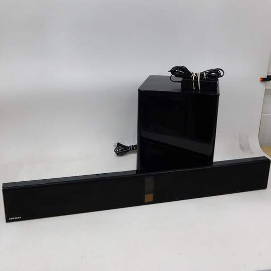 Samsung Brand PS-WF750 Subwoofer and HW-F750 Sound Bar w/ Cables image number 1
