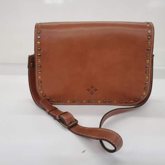 Patricia Nash Vitellia Heritage Brown Leather Studded Flap Saddle Shoulder Bag image number 1