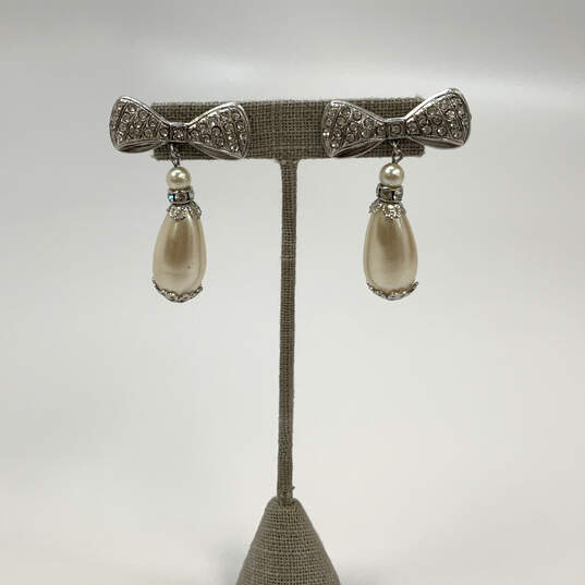 Designer Kirks Folly Silver-Tone Shiny Pearl And Crystal Bow Drop Earrings image number 2