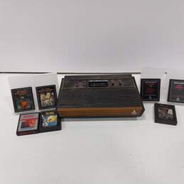 Atari 2600 Console w/ 7 Assorted Games