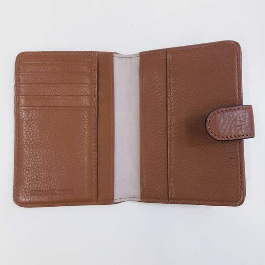 Michael Kors Pebbled Leather Passport Holder Tan image number 7