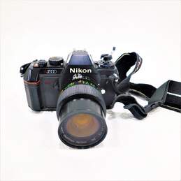 Nikon Brand N2000 Model Film Camera w/ Case, Lenses, and Accessories alternative image