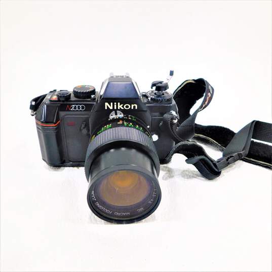 Nikon Brand N2000 Model Film Camera w/ Case, Lenses, and Accessories image number 2