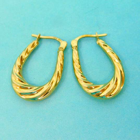 14K Yellow Gold Swirl Oblong Hoop Earrings 1.6g image number 1