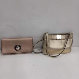 Pair of Rose Gold Leather Hand Bags