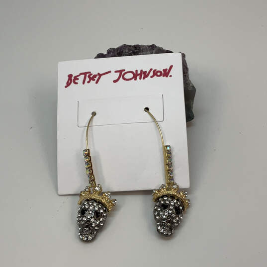 Designer Betsey Johnson Gold-Tone Rhinestone Crown Skull Dangle Earrings image number 1