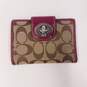 Coach Signature Canvas Bifold Wallet Turnlock Brown Burgundy image number 1
