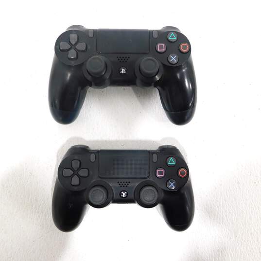 4 Used Sony Dualshock 4 Controllers image number 2