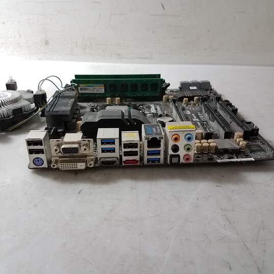 Untested ASRock Z87M Extreme4 Motherboard MicroATX W/ CPU and RAM image number 1