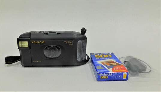 Polaroid Captive SLR Auto Focus Instant Film Camera w/ Expired Film Accessories image number 1