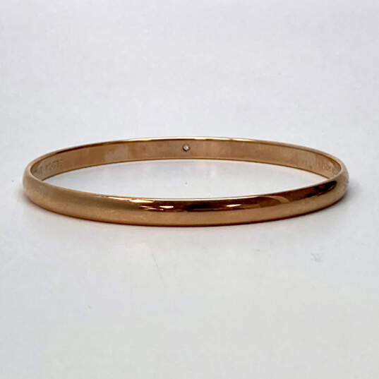 Designer Kate Spade New York Gold-Tone Round Shape Bangle Bracelet image number 3