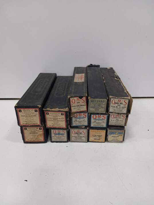 Bundle of 13 Assorted Vintage Piano Rolls in Boxes image number 2