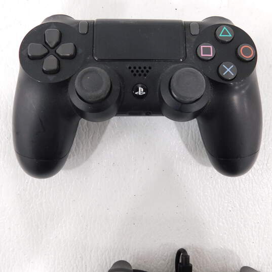 2 Used Dualshock 4 Controllers image number 3