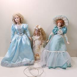 Bundle of 3 Assorted Porcelain Dolls w/Dresses