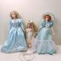 Bundle of 3 Assorted Porcelain Dolls w/Dresses image number 1