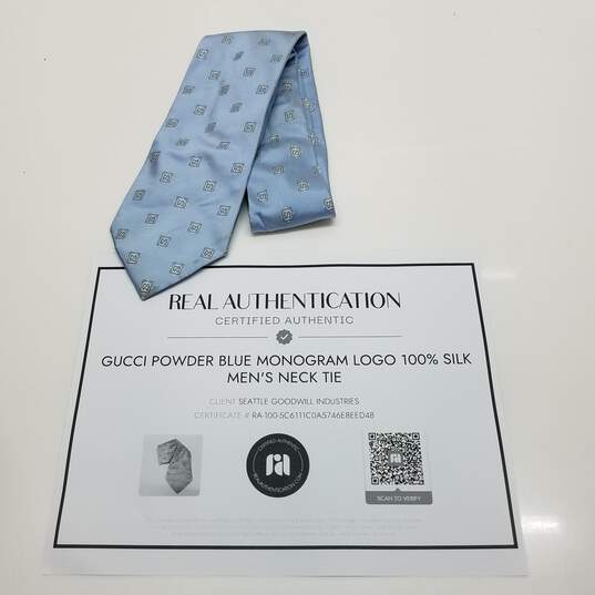 AUTHENTICATED Gucci Powder Blue Monogram Logo Silk Mens Neck Tie image number 1