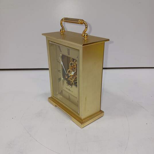 Howard Miller Gold Tone Gear Table Desk Clock Brass Carriage image number 2