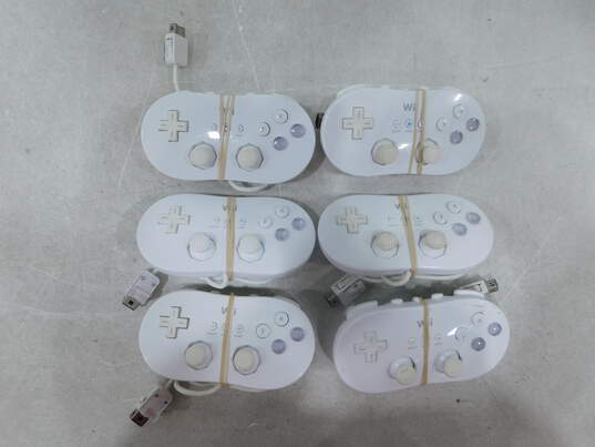10 Nintendo Wii Nunchuck Controllers + 10 Wii Classic/ Pro Controllers image number 2