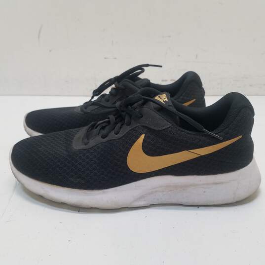 Nike Tanjun Black, Gold Sneakers 812655-004 Size 11 image number 2