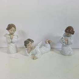Llandro Little Angles Set of 3  Porcelain Sculptures /Figurines