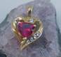 10K Yellow Gold Ruby & CZ Ribbon Heart Pendant 1.6g image number 1