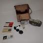 Untested Vintage Unfolding Instant Camera w/ Accessories & Case P/R image number 1