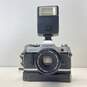 Vintage Canon AE-1 SLR Camera w/ Accessories image number 1