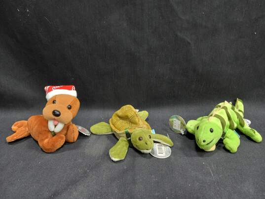 Buy the Bundle of 11 Coca-Cola Plush Animals | GoodwillFinds