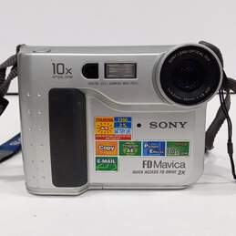 Gray Sony Video Camera w/ Strap alternative image