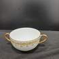 Bundle of 13 Saucers and 6 Cups that are White w/Gold Tone Trim image number 6